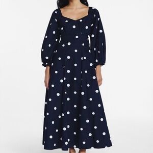 Gorgeous navy blue maxi dress with white polka dots.
